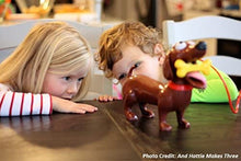 Load image into Gallery viewer, Goliath New &amp; Improved Doggie Doo - Squeeze The Leash Poop The Food Game, Brown