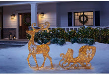Load image into Gallery viewer, Home Accents Holiday 65 in LED Lighted Gold Reindeer and 3.8 ft LED Lighted Gold Sleigh with Silver Bows