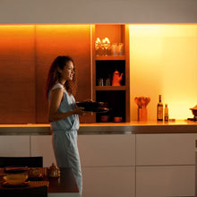 Load image into Gallery viewer, Philips Hue LightStrip Plus Dimmable LED Smart Light Extension (Works with Alexa Apple HomeKit and Google Assistant)