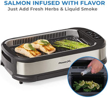 Load image into Gallery viewer, PowerXL Smokeless Grill with Tempered Glass Lid and Turbo Speed Smoke Extractor Technology. Make Tender Char-grilled Meals Inside With Virtually No Smoke