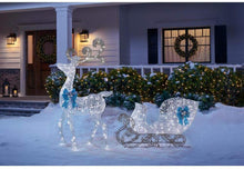 Load image into Gallery viewer, Home Accents Holiday Icicle Shimmer 65 in. LED Lighted White Reindeer and 46 in. LED Lighted White Sleigh with Blue Bows