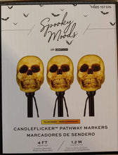 Load image into Gallery viewer, Gemmy Lightshow Flickering Skulls Halloween Pathway Markers (3-Count)