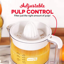 Load image into Gallery viewer, Dash Citrus Juicer Extractor: Compact Juicer for Healthy Juice, Oranges, Lemons, Limes, Grapefruit &amp; other Citrus Fruit with Easy Pour Spout + 32 oz Pitcher