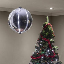 Load image into Gallery viewer, Alpine Corporation LPA108L-SL Hanging Christmas Ball Ornament with Chasing LED Lights Plug-in Festive Indoor Holiday Décor, 13-Inch Tall, Silver
