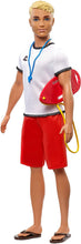 Load image into Gallery viewer, Ken Lifeguard Doll with Life Buoy, Whistle and Blonde Hair Wearing T-Shirt, Red Swim Trunks and Flip-Flops, Gift for 3 to 7 Year Old