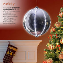 Load image into Gallery viewer, Alpine Corporation LPA108L-SL Hanging Christmas Ball Ornament with Chasing LED Lights Plug-in Festive Indoor Holiday Décor, 13-Inch Tall, Silver