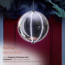 Load image into Gallery viewer, Alpine Corporation LPA108L-SL Hanging Christmas Ball Ornament with Chasing LED Lights Plug-in Festive Indoor Holiday Décor, 13-Inch Tall, Silver