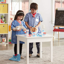 Load image into Gallery viewer, Melissa &amp; Doug Examine &amp; Treat Pet Vet Play Set - The Original (24 Pieces, Great Gift for Girls and Boys - Kids Toy Best for 3, 4, 5 Year Olds and Up)