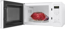 Load image into Gallery viewer, GE Appliances Black Countertop Microwave