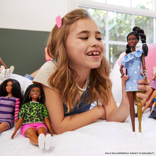 Load image into Gallery viewer, Barbie Fashionistas Doll #146 with 2 Twisted Braids &amp; Prosthetic Leg Wearing Star-Print Dress, White Shoes &amp; Arm Bracelet, Toy for Kids 3 to 8 Years Old