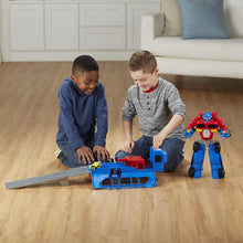 Load image into Gallery viewer, Playskool Heroes Transformers RBT Optimus Prime Race Track Trailer Playset