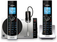 Load image into Gallery viewer, VTech DS6771-3 DECT 6.0 Expandable Cordless Phone with Connect to Cell, Siri and Google Now Access, Silver/Black, 2 Handsets and 1 Cordless Headset