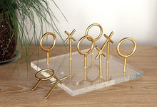 Load image into Gallery viewer, CosmoLiving by Cosmopolitan 56988 Glam Style Metallic Gold Tic Tac Toe Game Set on Clear Acrylic Board