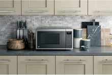 Load image into Gallery viewer, GE JES1097SMSS 0.9 Cu. Ft. Capacity Smart Countertop Microwave Oven with Scan-To-Cook Technology, WiFi Connect, Convenience Cooking Controls, and Auto and Time Defrost, in Stainless Steel