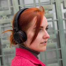 Load image into Gallery viewer, JLab Audio Studio Bluetooth Wireless On-Ear Headphones | 30+ Hour Bluetooth 5 Playtime | EQ3 Sound | Ultra-Plush Faux Leather &amp; Cloud Foam Cushions | Track and Volume Controls