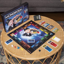 Load image into Gallery viewer, Monopoly Super Electronic Banking Board Game, Electronic Banking Unit, Choose Your Rewards, Cashless Gameplay Tap Technology, for Ages 8 and Up