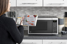 Load image into Gallery viewer, GE JES1097SMSS 0.9 Cu. Ft. Capacity Smart Countertop Microwave Oven with Scan-To-Cook Technology, WiFi Connect, Convenience Cooking Controls, and Auto and Time Defrost, in Stainless Steel